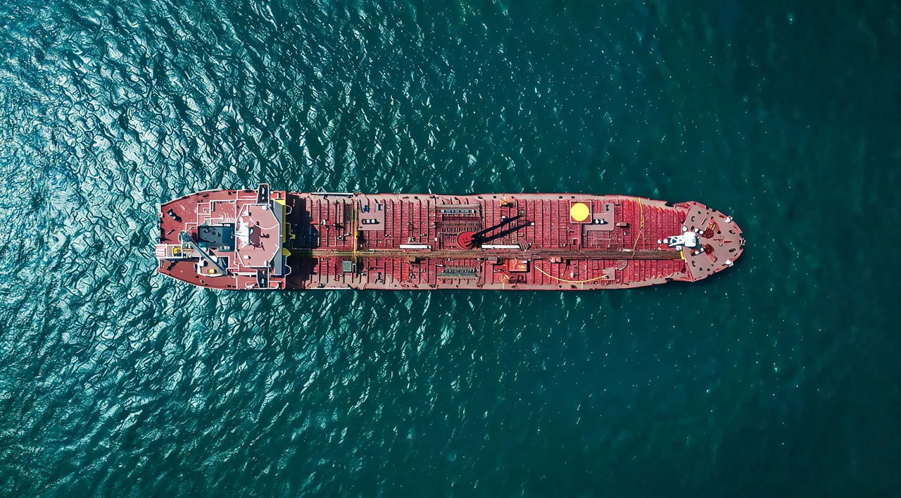 Aerial view of a tanker vessel underway during a biofuel-blend delivery